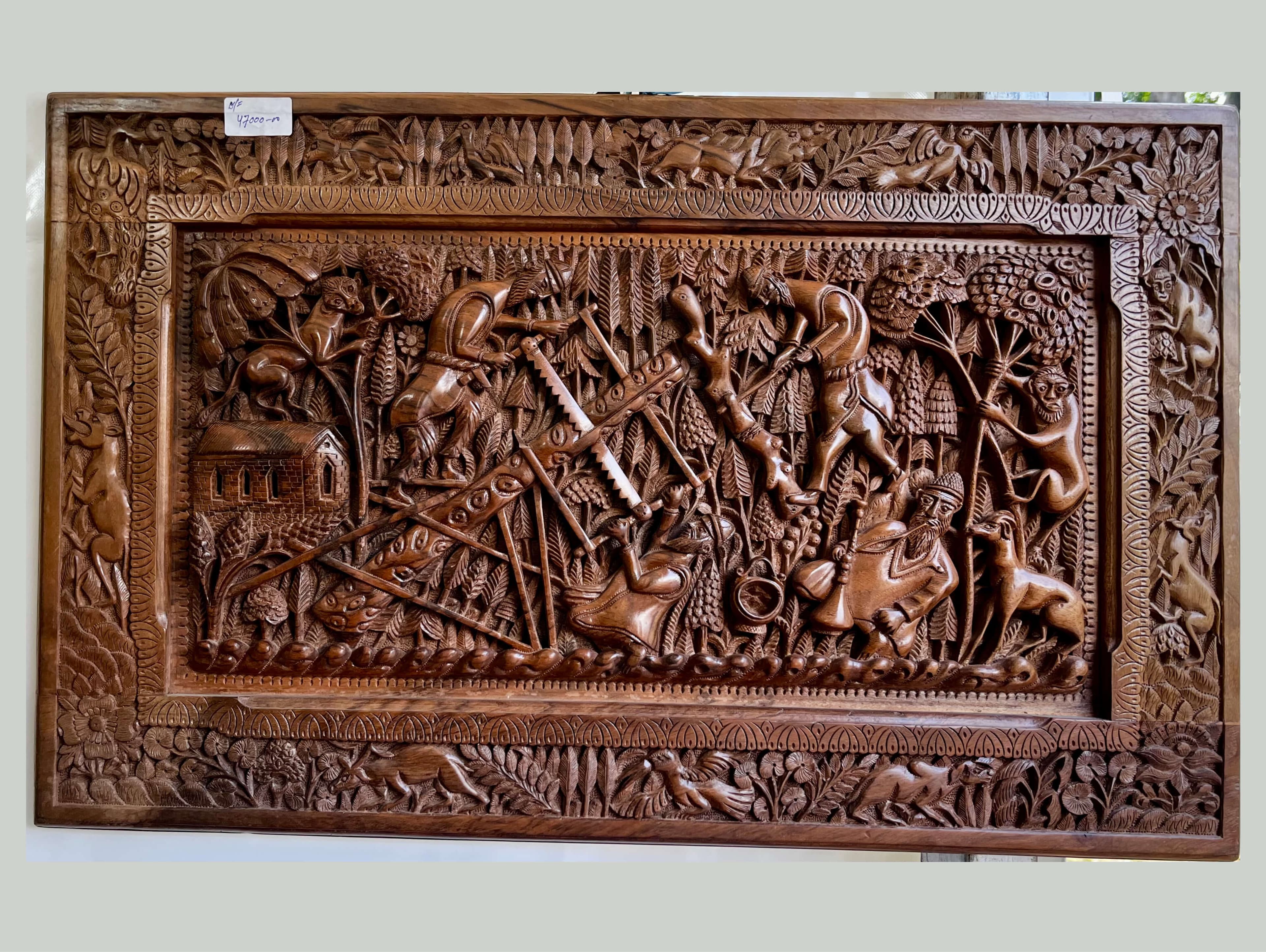 Hand-Carved Walnut wood carving [Men cutting trees in a Forest]